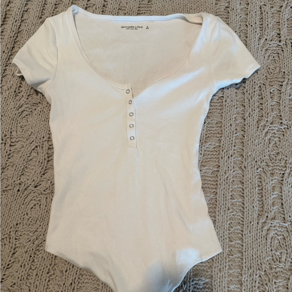 Chic White Ribbed Bodysuit with Button Detail
